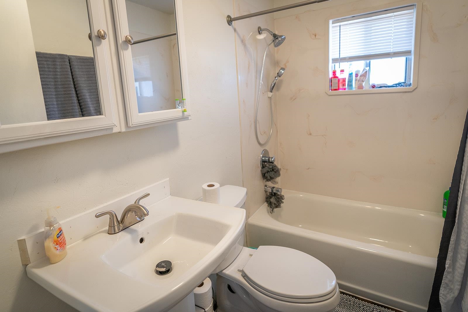441 South Camp Road Grand Junction, CO 81507 - Photo 31 of 36 a bathroom with a sink a toilet and a bathtub