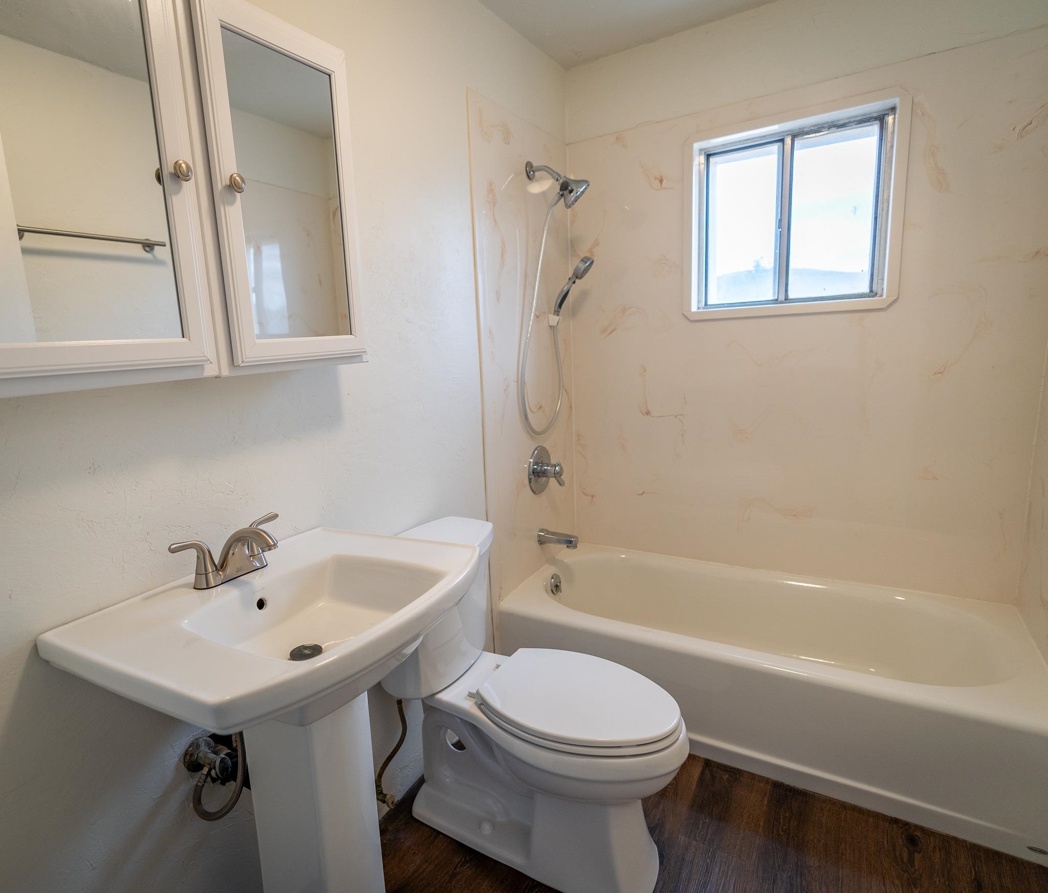 441 South Camp Road Grand Junction, CO 81507 - Photo 32 of 36 a bathroom with a sink a toilet and a bathtub