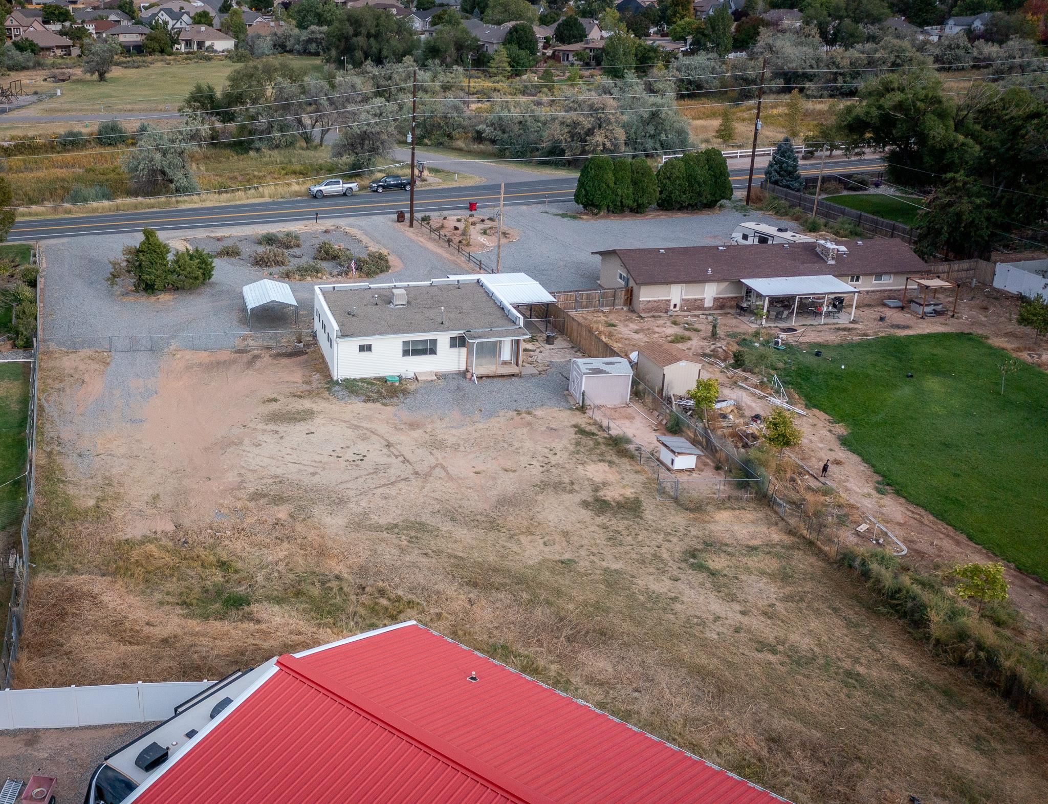 441 South Camp Road Grand Junction, CO 81507 - Photo 4 of 36 an aerial view of a house with a yard