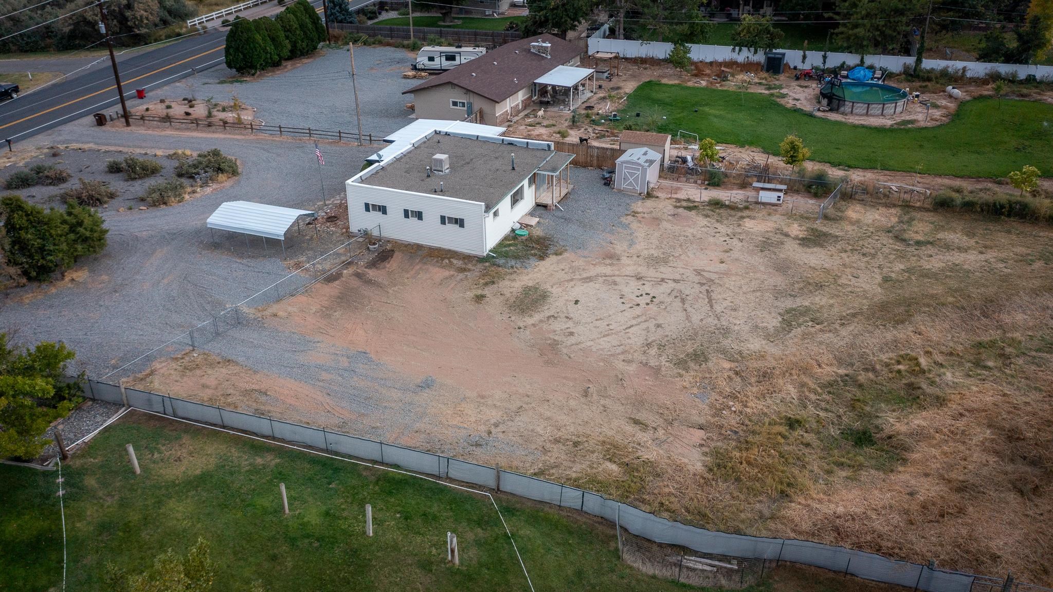 441 South Camp Road Grand Junction, CO 81507 - Photo 5 of 36 an aerial view of a house with garden space