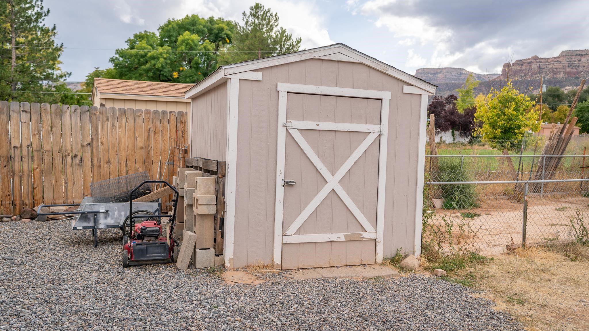 441 South Camp Road Grand Junction, CO 81507 - Photo 8 of 36 a front view of a house with garden