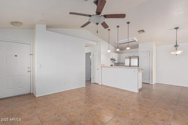 a view of a kitchen with a sink and cabinet