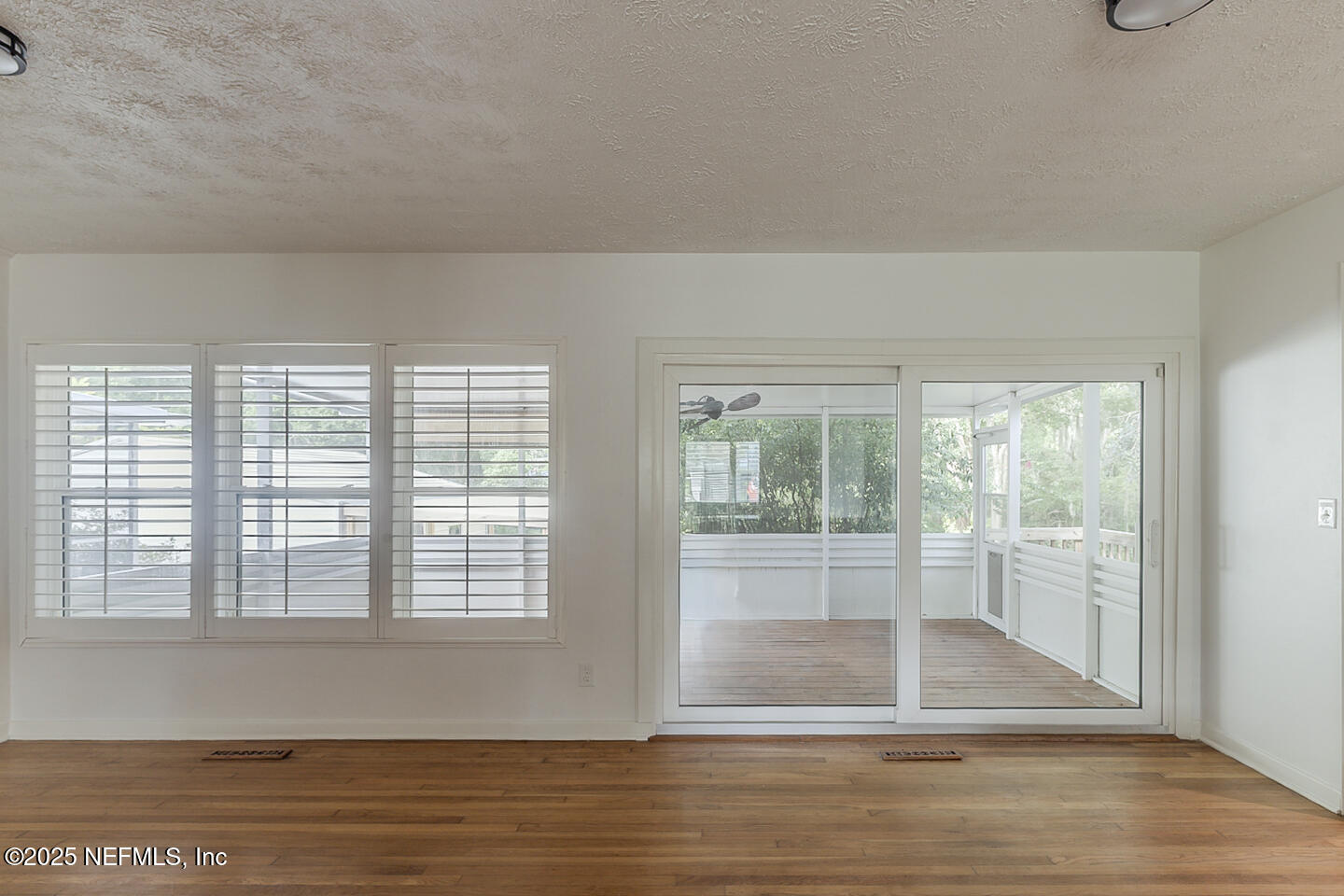 6508 Colgate Road Jacksonville, FL 32217 - Photo 3 of 15 a view of wooden floor and cabinet in a room