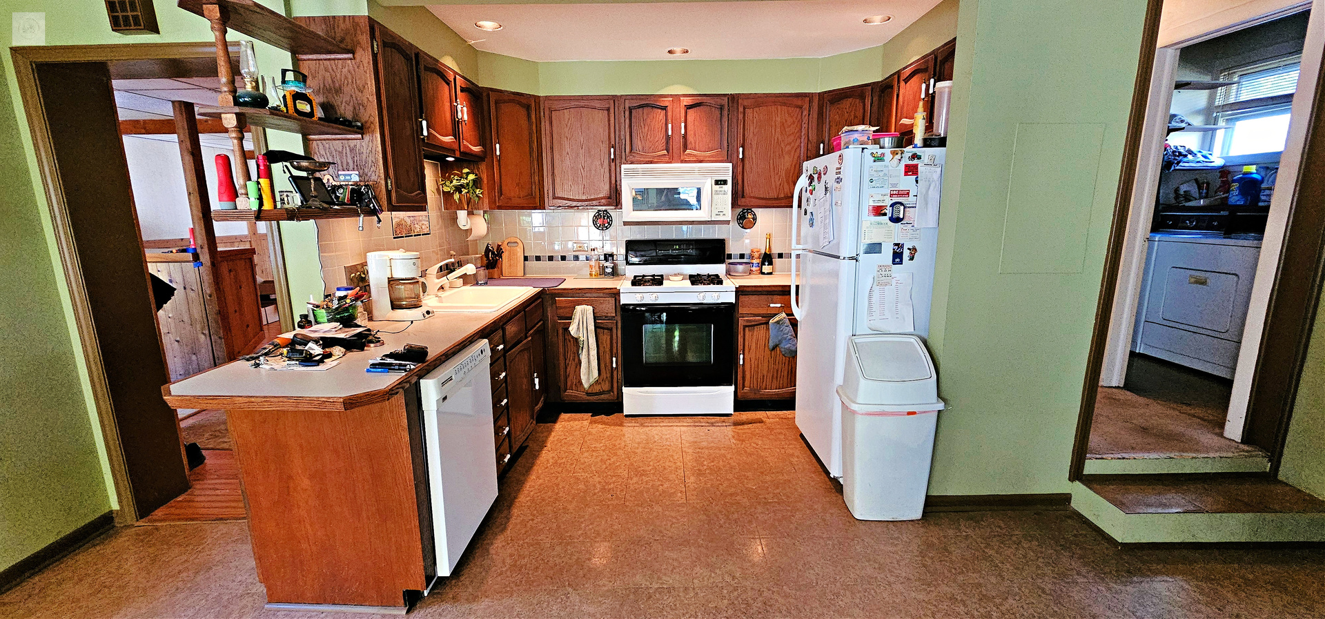 7730 Virginia Court Willowbrook, IL 60527 - Photo 11 of 33 a kitchen with stainless steel appliances granite countertop a refrigerator and a stove