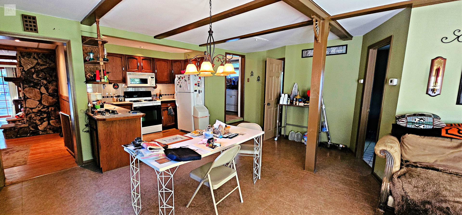 7730 Virginia Court Willowbrook, IL 60527 - Photo 12 of 33 a view of a dining room with furniture and a window