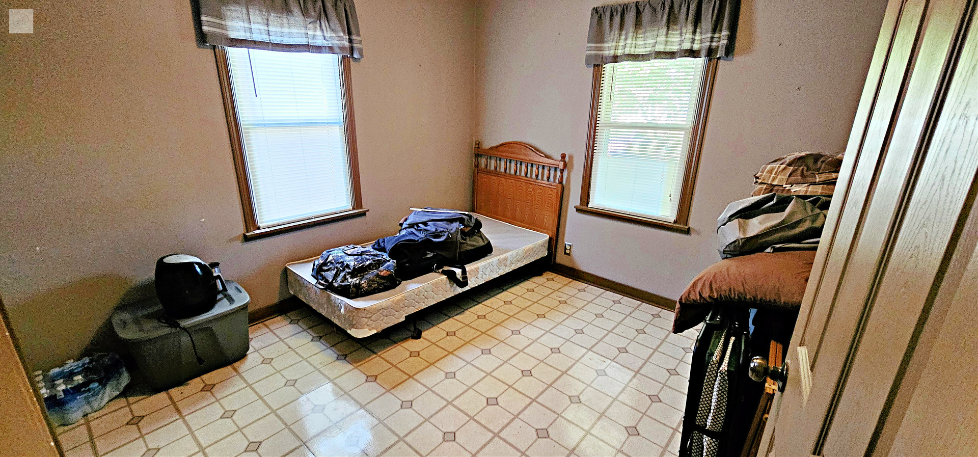 7730 Virginia Court Willowbrook, IL 60527 - Photo 20 of 33 a living room with furniture and a window