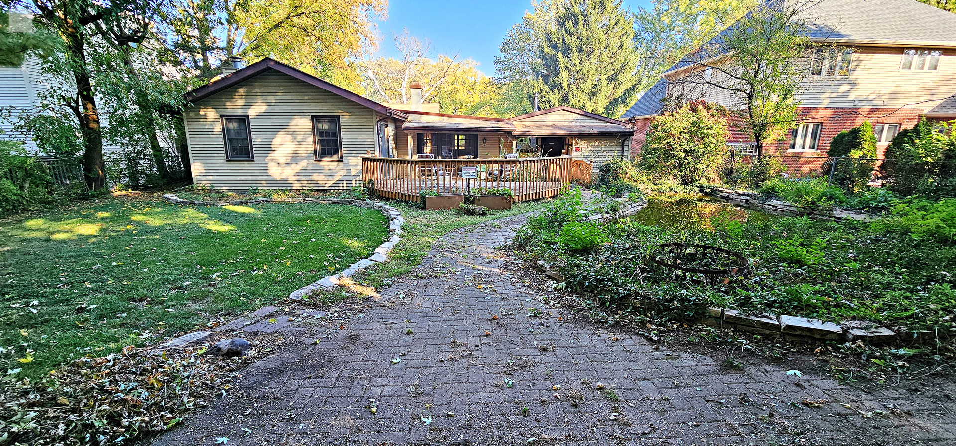 7730 Virginia Court Willowbrook, IL 60527 - Photo 27 of 33 a view of a house with yard and sitting area