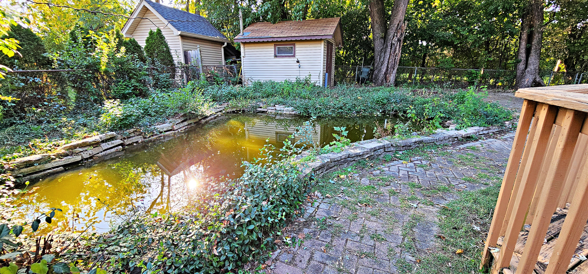 7730 Virginia Court Willowbrook, IL 60527 - Photo 30 of 33 a view of a house with swimming pool next to a yard