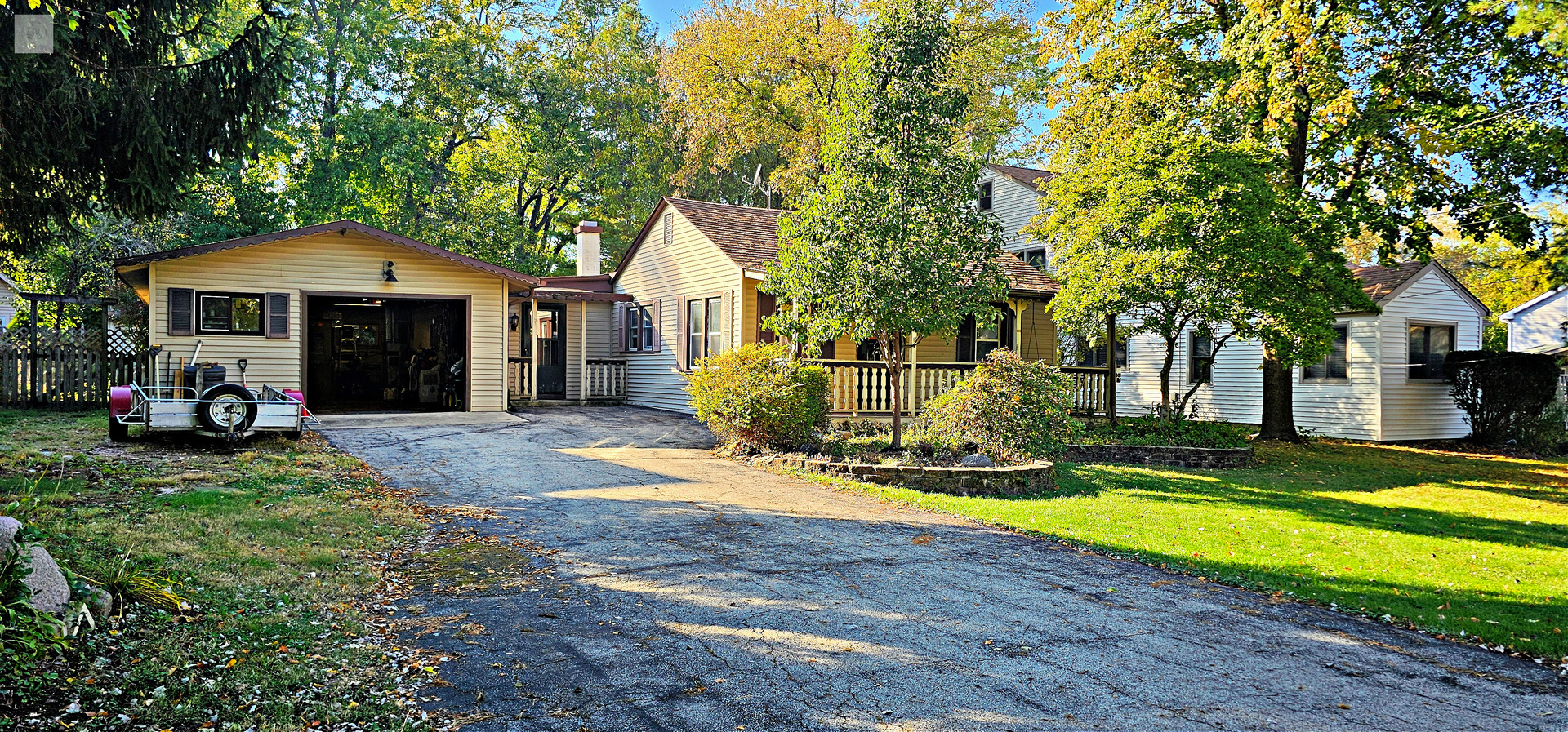 7730 Virginia Court Willowbrook, IL 60527 - Photo 3 of 33 a view of a house with swimming pool and sitting area