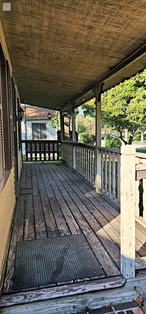 7730 Virginia Court Willowbrook, IL 60527 - Photo 4 of 33 a view of a chairs on the deck