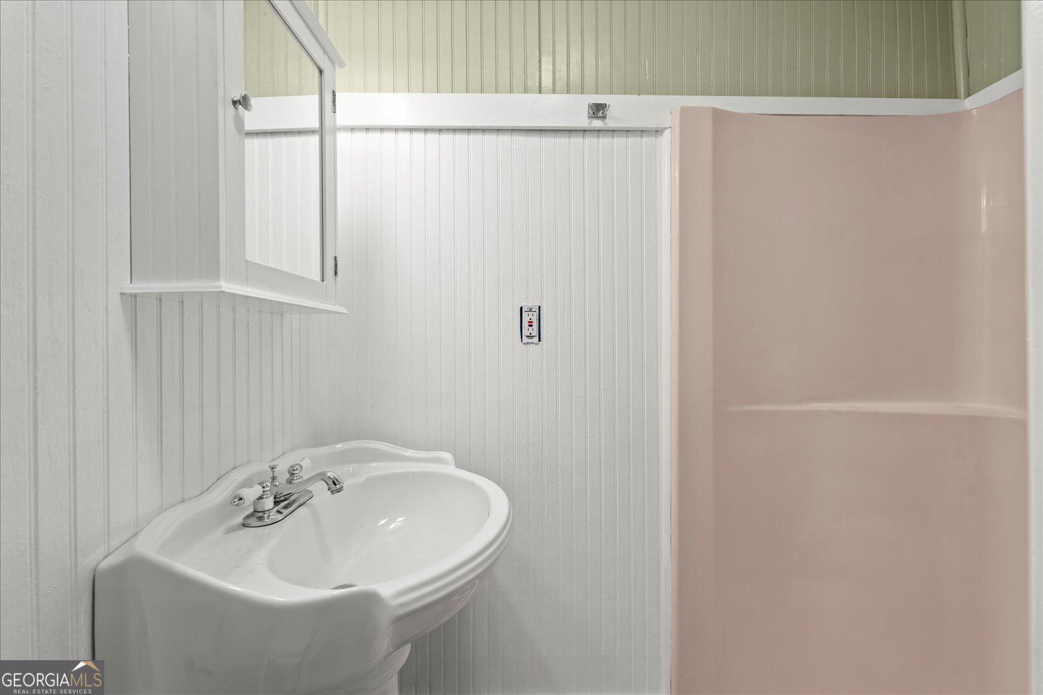 528 North Alexander Avenue Washington, GA 30673 - Photo 12 of 42 a bathroom with a sink a mirror and vanity