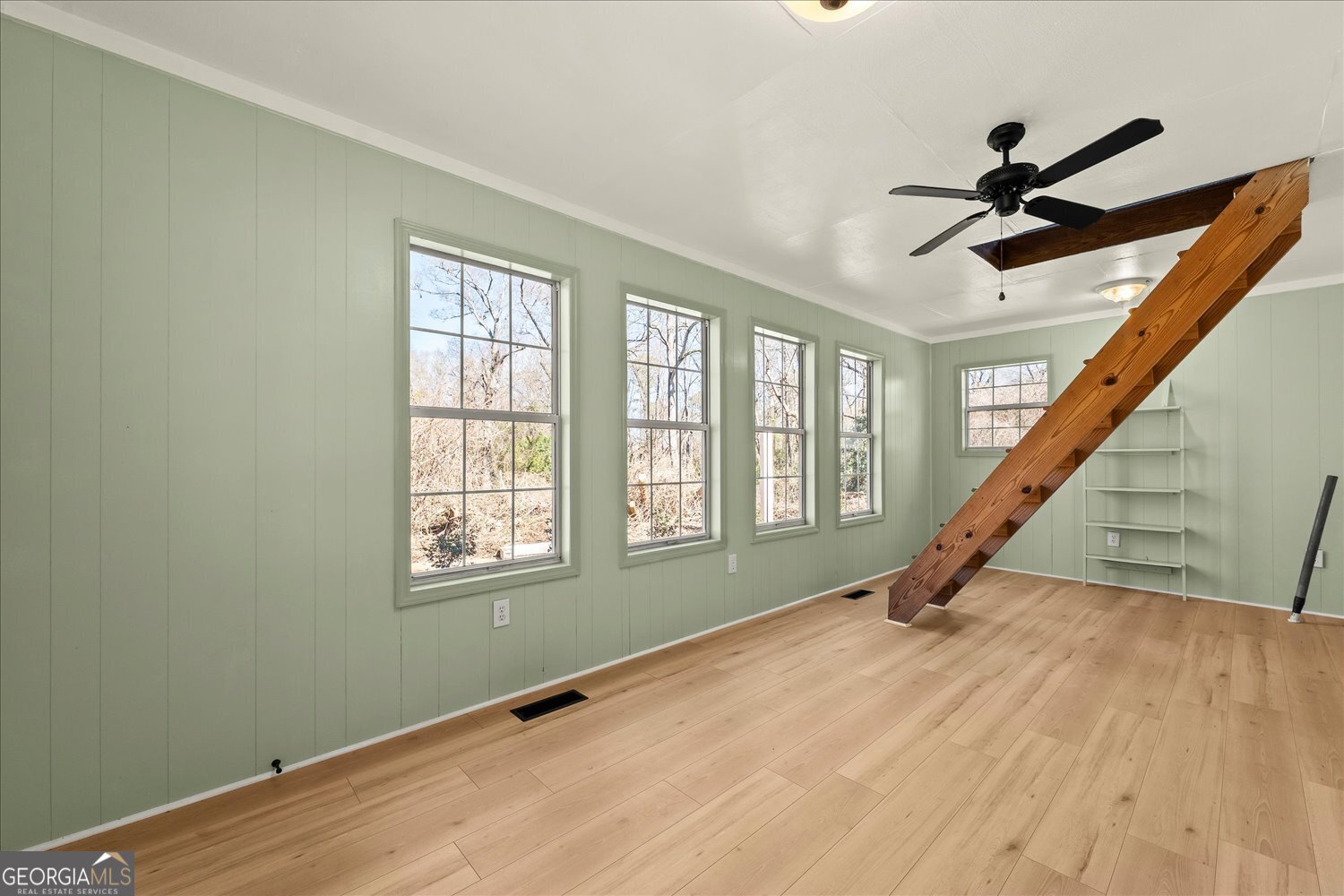 528 North Alexander Avenue Washington, GA 30673 - Photo 24 of 42 a view of an entryway with wooden floor and windows