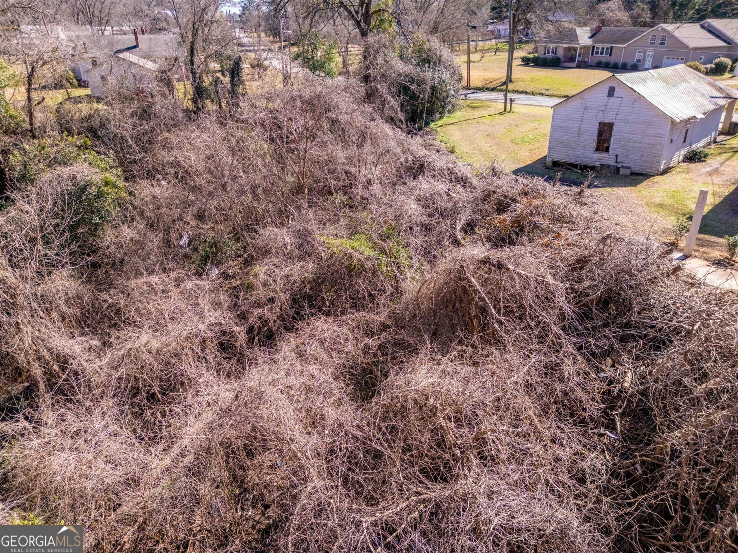 528 North Alexander Avenue Washington, GA 30673 - Photo 38 of 42 a view of a swimming pool with a yard
