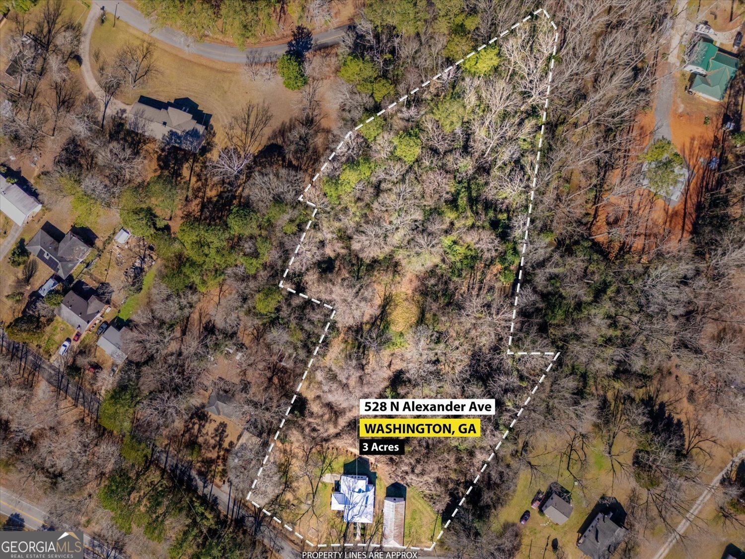 528 North Alexander Avenue Washington, GA 30673 - Photo 40 of 42 a view of a street with houses