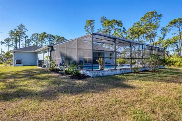 a view of a yard with a garden
