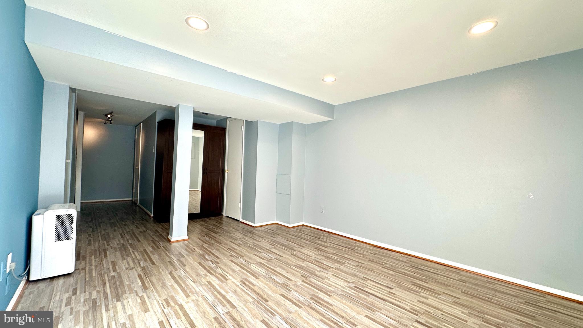 3423 Santee Road Nottingham, MD 21236 - Photo 22 of 30 a view of hallway with wooden floor