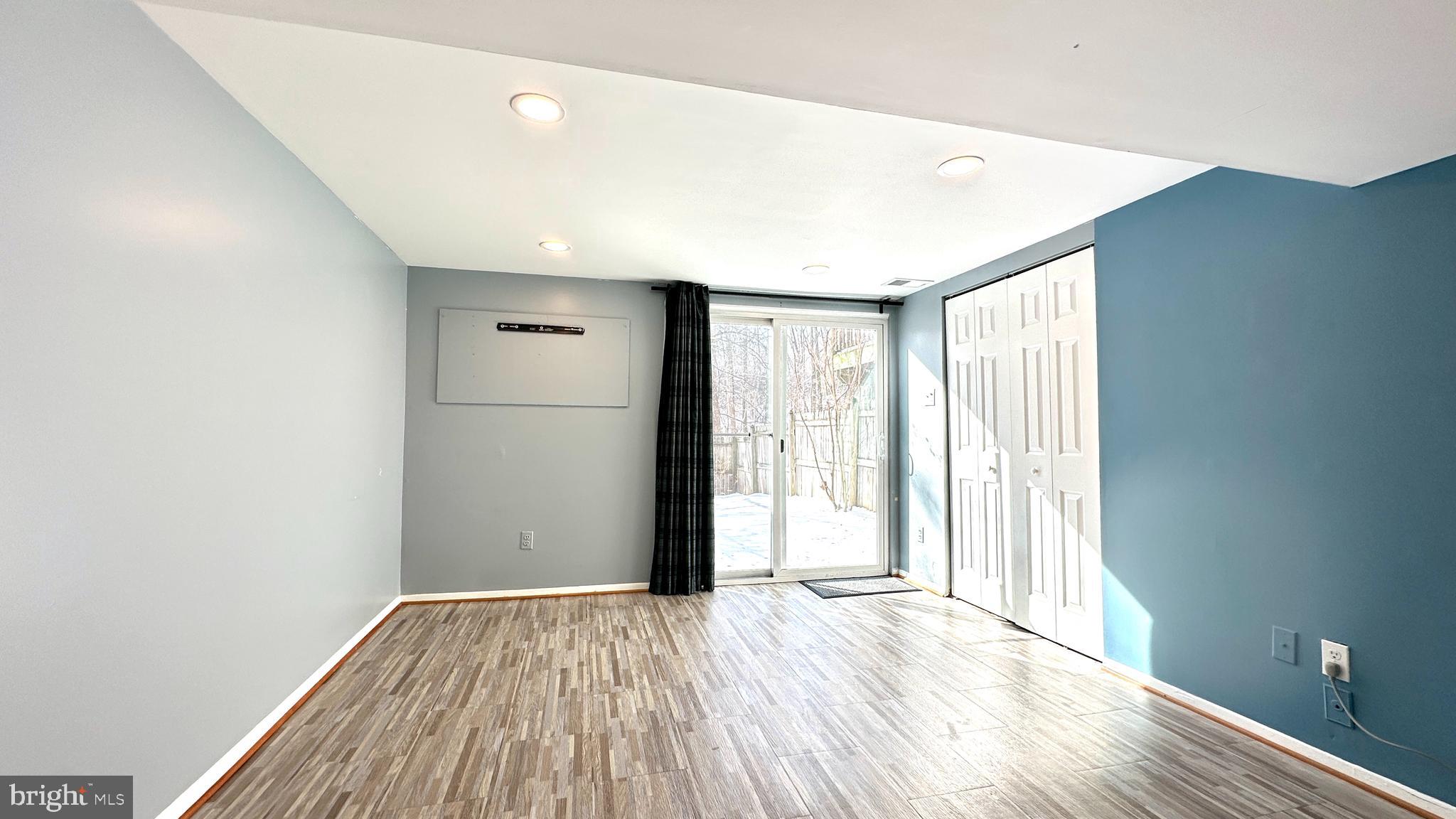 3423 Santee Road Nottingham, MD 21236 - Photo 24 of 30 a view of empty room with wooden floor and fan