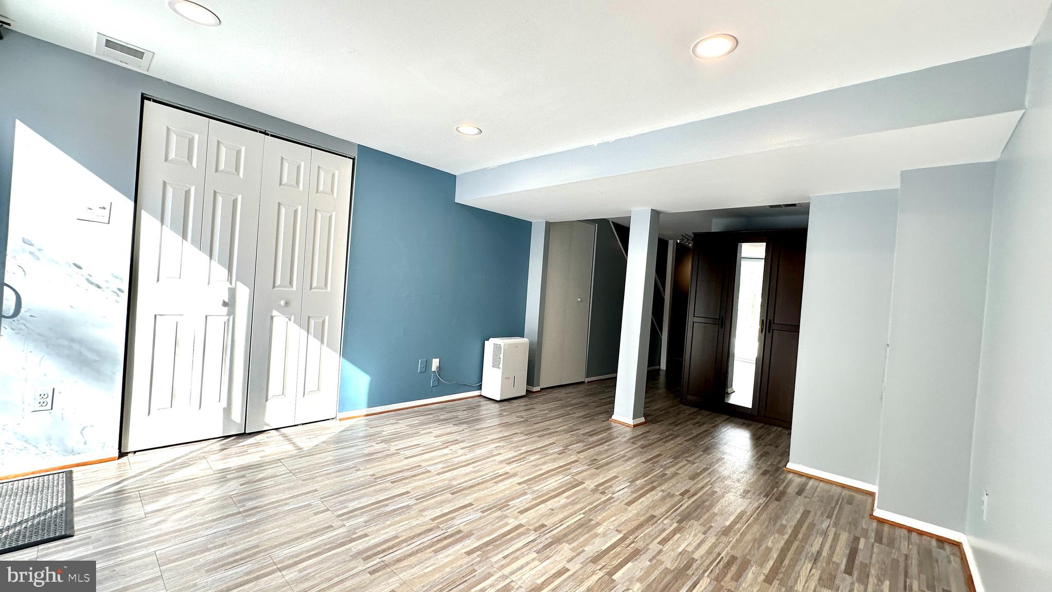 3423 Santee Road Nottingham, MD 21236 - Photo 25 of 30 wooden floor in an empty room with a window