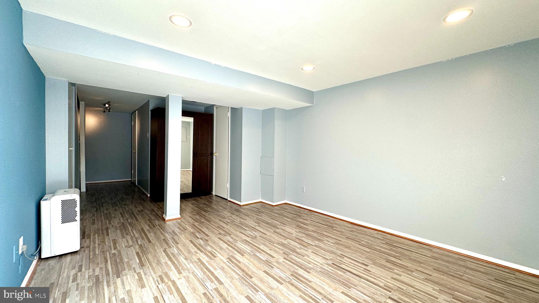 3423 Santee Road Nottingham, MD 21236 - Photo 26 of 30 a view of hallway with wooden floor