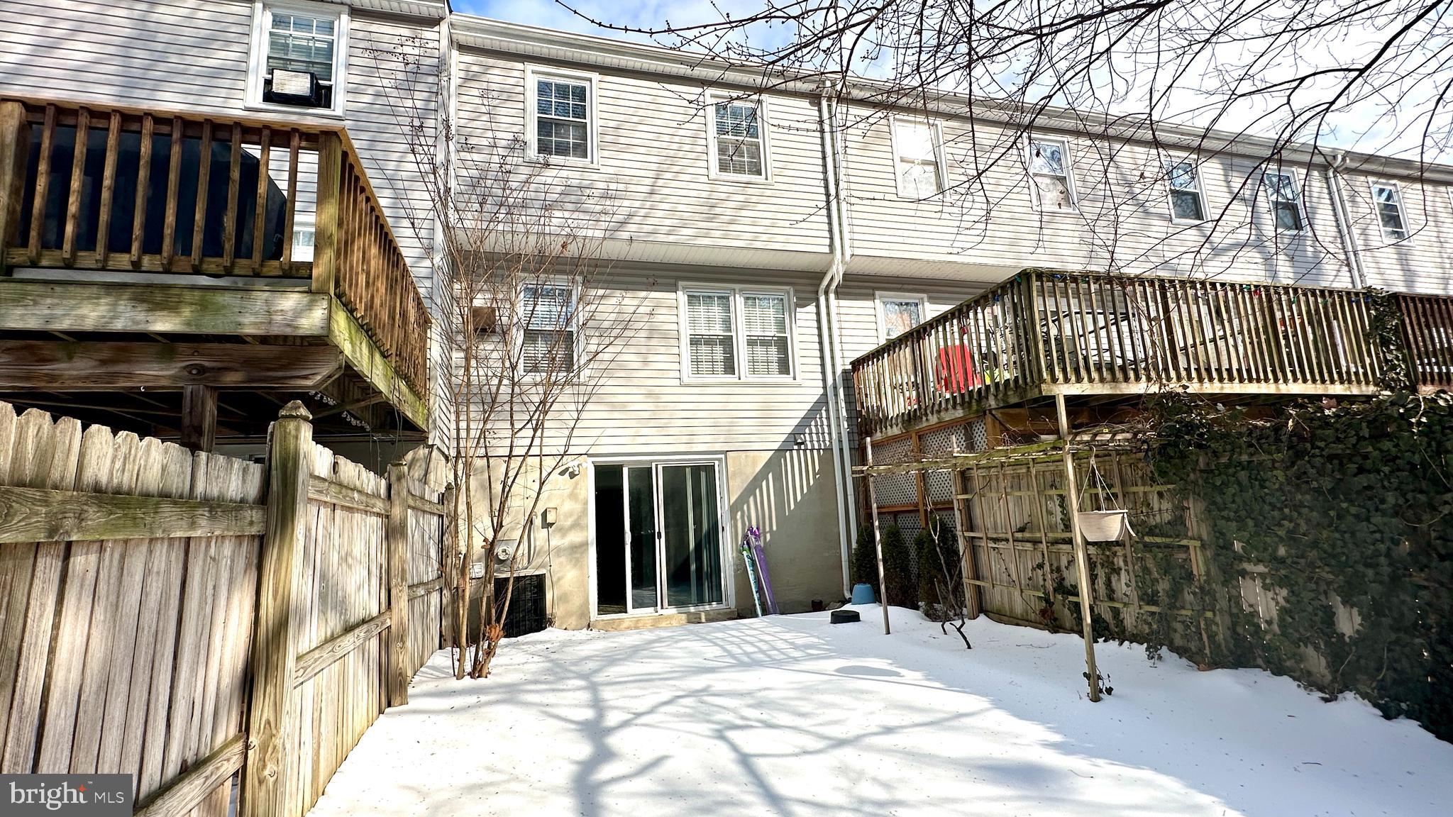 3423 Santee Road Nottingham, MD 21236 - Photo 29 of 30 a view of a building with a door and outdoor space