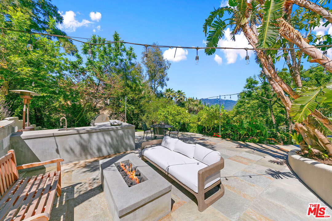 1876 Lookout Road Malibu, CA 90265 - Photo 2 of 48 a view of patio with couches and pool