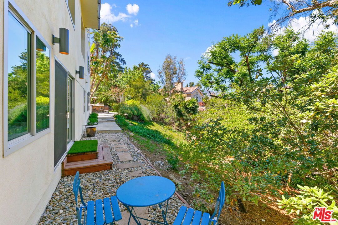 1876 Lookout Road Malibu, CA 90265 - Photo 37 of 48 a backyard of a house with outdoor seating