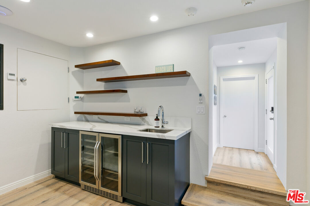 1876 Lookout Road Malibu, CA 90265 - Photo 39 of 48 a hallway with cabinets