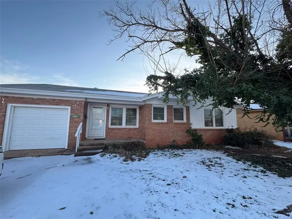 a house view with a backyard space