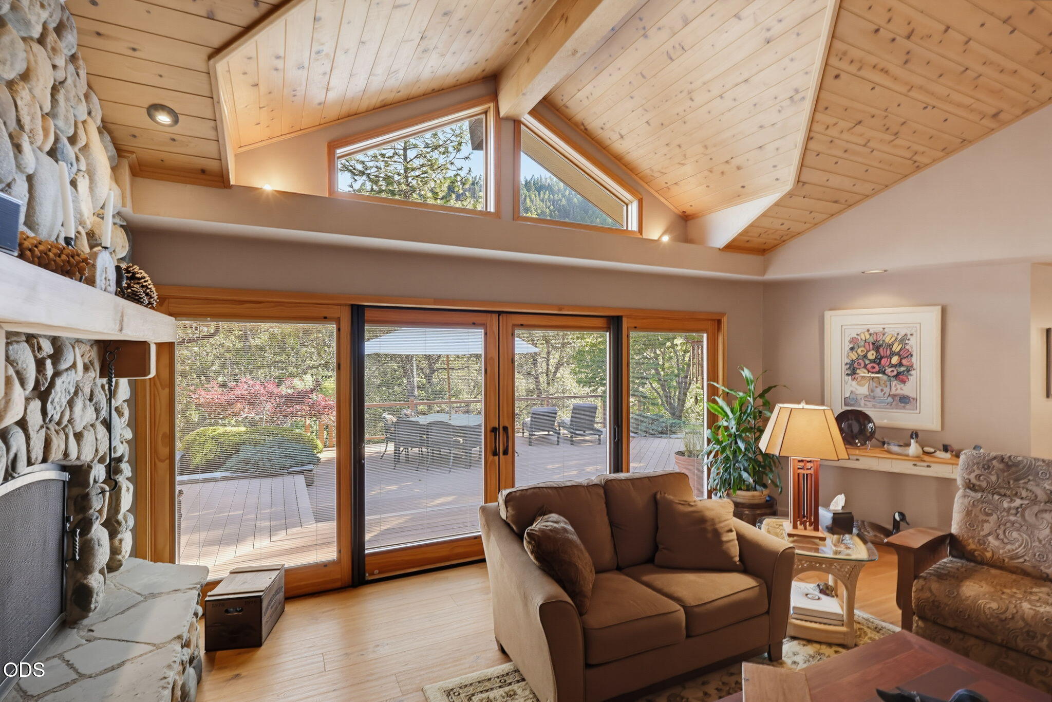 2459 Little Applegate Road Jacksonville, OR 97530 - Photo 12 of 86 a living room with furniture and a floor to ceiling window