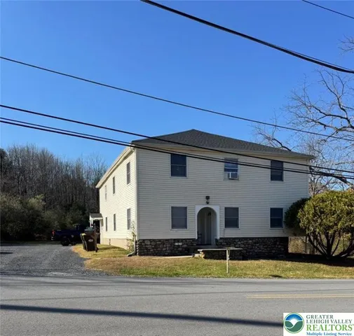 a view of a house with sitting area and small area