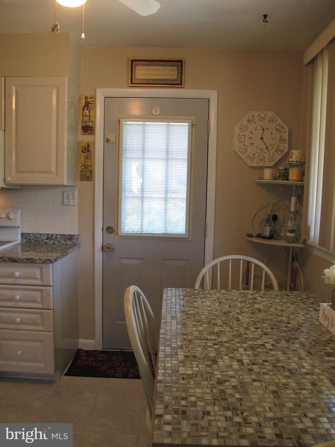 19 North Line Road Newtown Square, PA 19073 - Photo 9 of 39 Kitchen door to side yard and path to rear yard