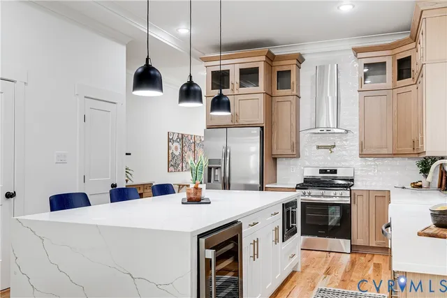 a kitchen with a stove and a white refrigerator