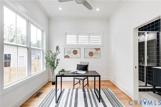 a workspace with furniture and a window