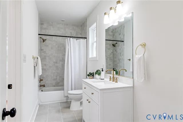 a bathroom with a double vanity sink mirror double and shower