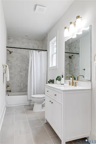 a bathroom with a bathtub a sink and a shower