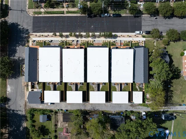 a view of a building with sitting area