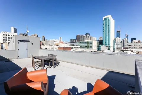 a view of dinning table and chairs in the terrace