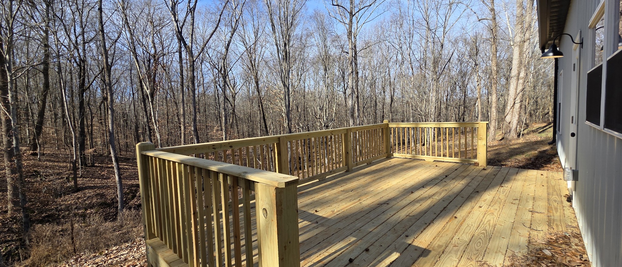4151 Southside Road Southside, TN 37171 - Photo 16 of 17 a view of balcony with a large window and wooden floor