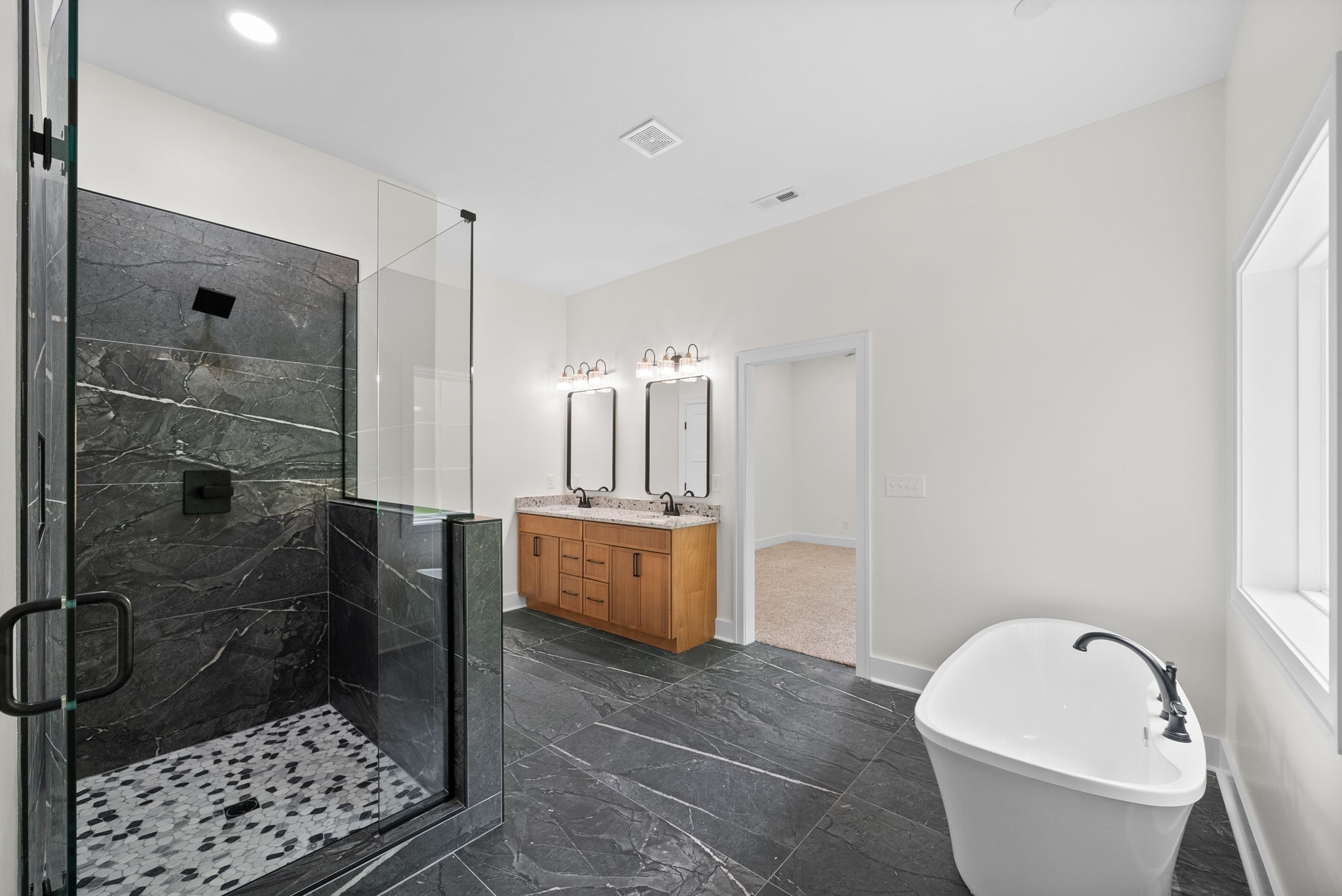 4151 Southside Road Southside, TN 37171 - Photo 9 of 17 a bathroom with a bathtub and a shower