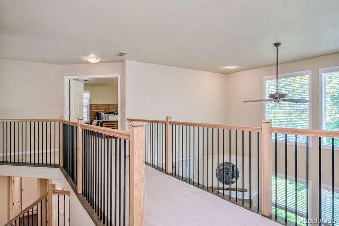 877 Eldorado Drive Superior, CO 80027 - Photo 15 of 34 a view of a balcony with wooden floor