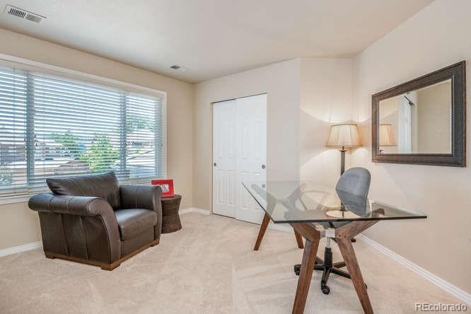 877 Eldorado Drive Superior, CO 80027 - Photo 22 of 34 a living room with furniture and a window