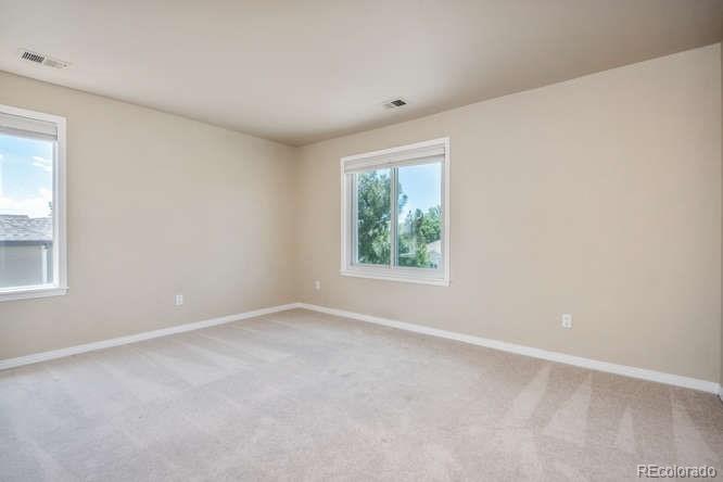 877 Eldorado Drive Superior, CO 80027 - Photo 23 of 34 an empty room with windows