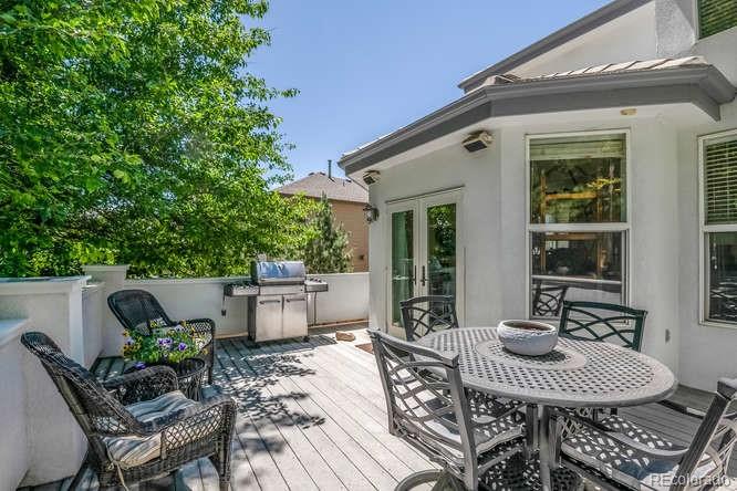 877 Eldorado Drive Superior, CO 80027 - Photo 29 of 34 a view of a patio with table and chairs and potted plants