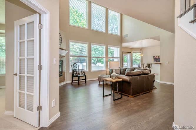 877 Eldorado Drive Superior, CO 80027 - Photo 5 of 34 a living room with furniture and large windows