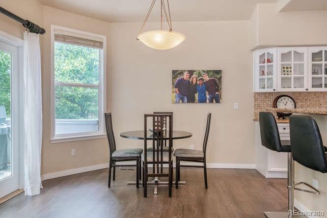 877 Eldorado Drive Superior, CO 80027 - Photo 10 of 34 a view of a dining room with furniture window and outside view