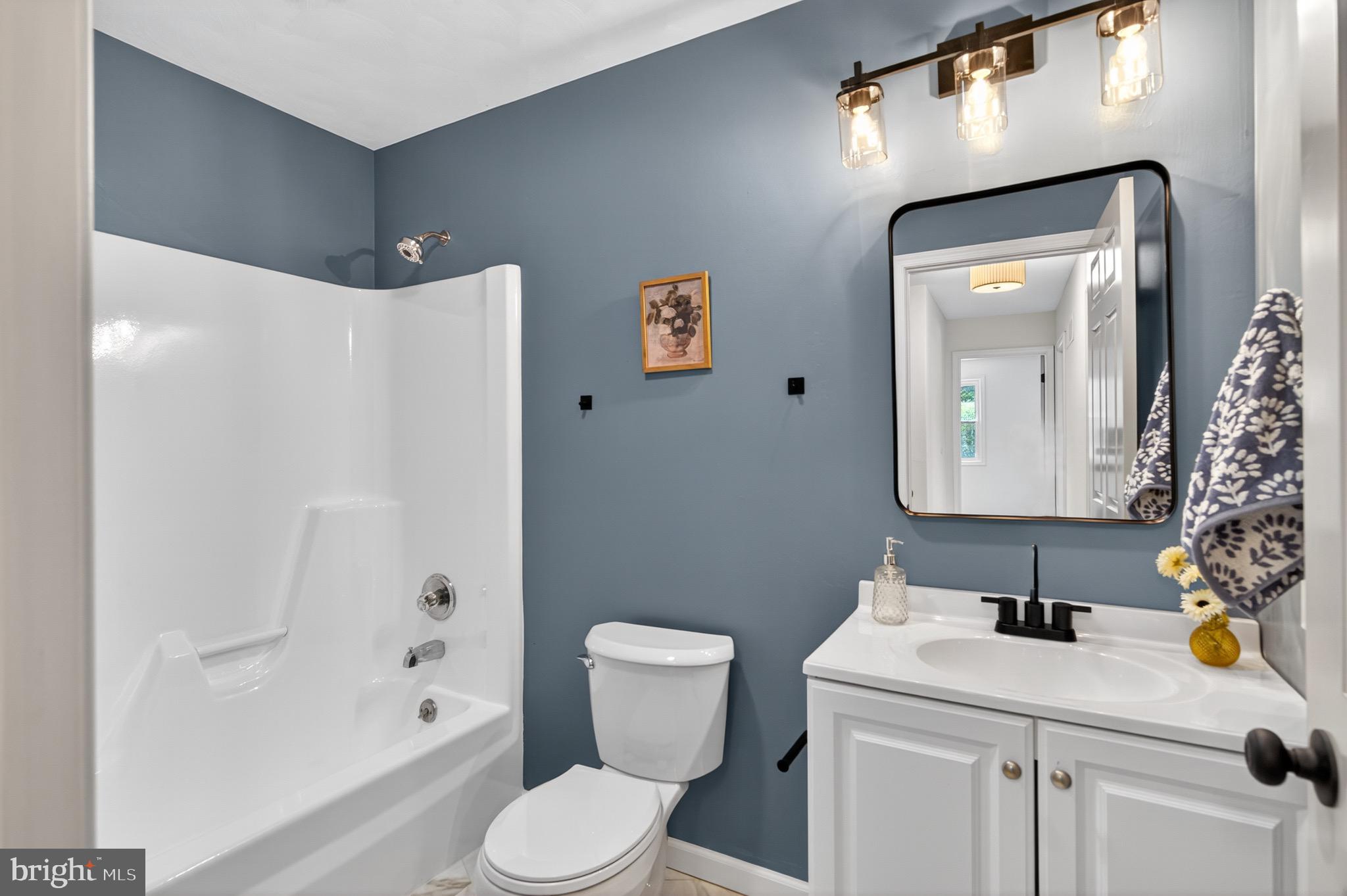 290 Montclair Road Gettysburg, PA 17325 - Photo 14 of 28 a bathroom with a sink toilet and shower