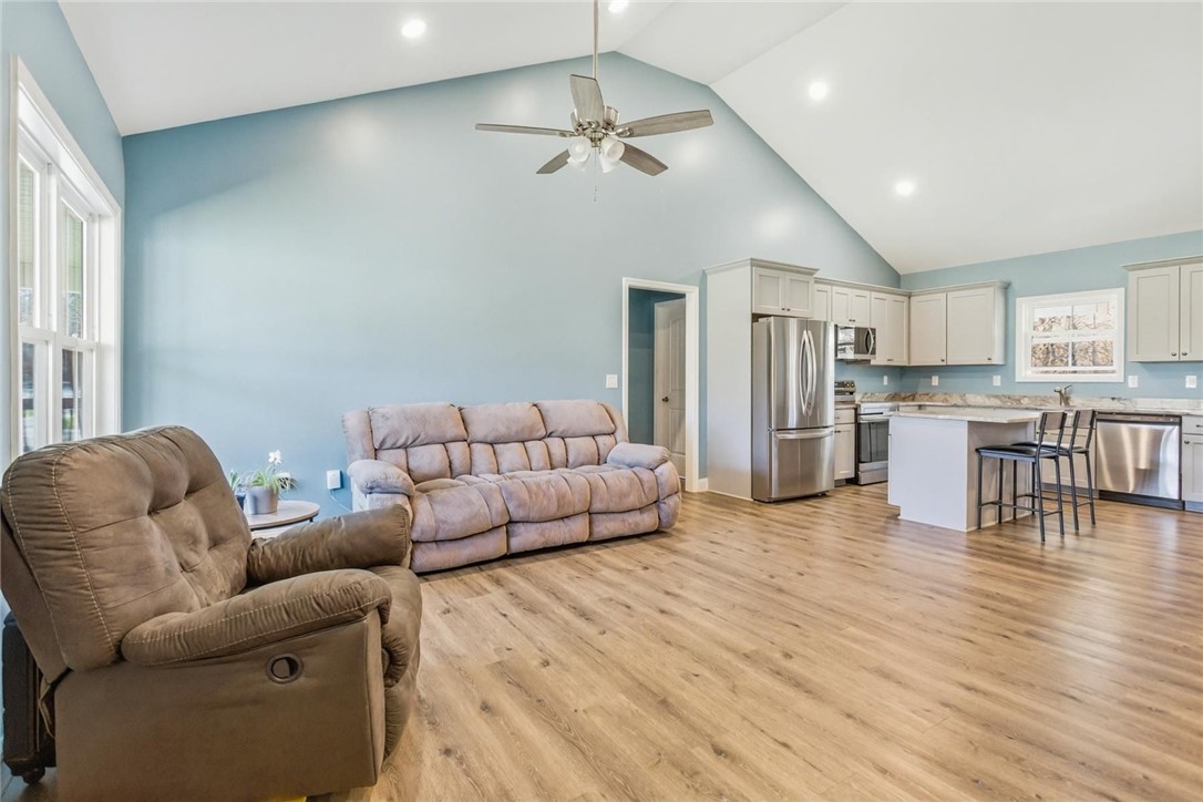 745 Dave Nix Road Seneca, SC 29678 - Photo 6 of 23 Vast vaulted ceilings and recessed lighting define this inviting open-concept living space with a contemporary kitchen.