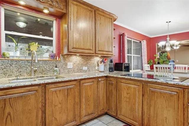a dining area with furniture and window