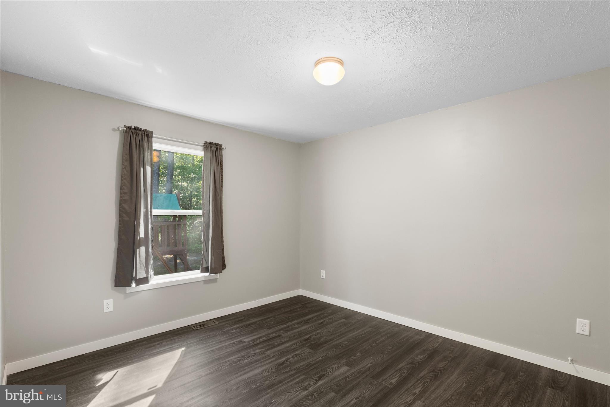 9249 Croppers Island Road Newark, MD 21841 - Photo 43 of 48 BEDROOM 4 HAS LVP FLOORING