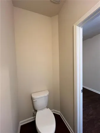 a bathroom with a toilet
